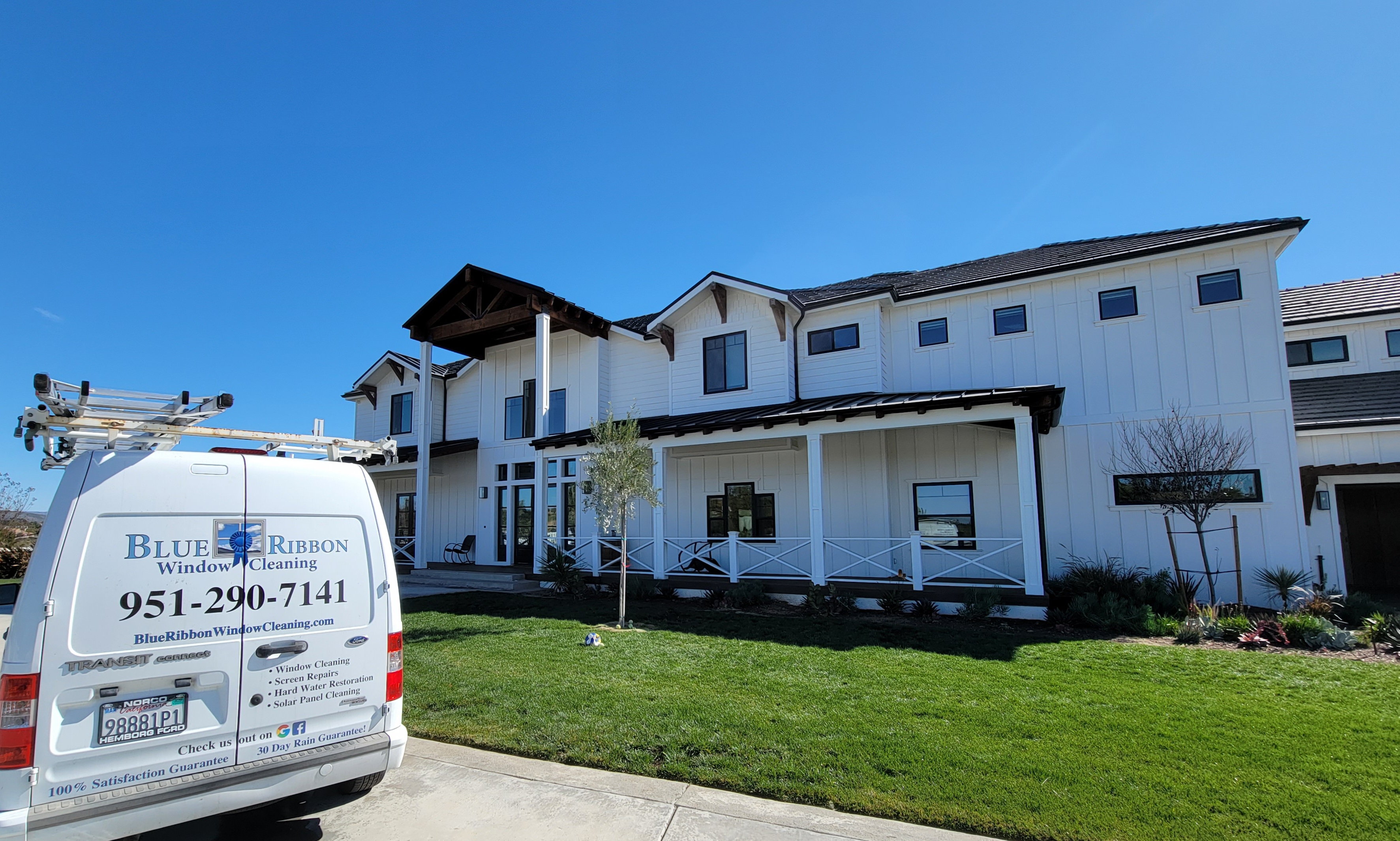 Blue Ribbon Window Cleaning van parked at a Murrieta residential job site